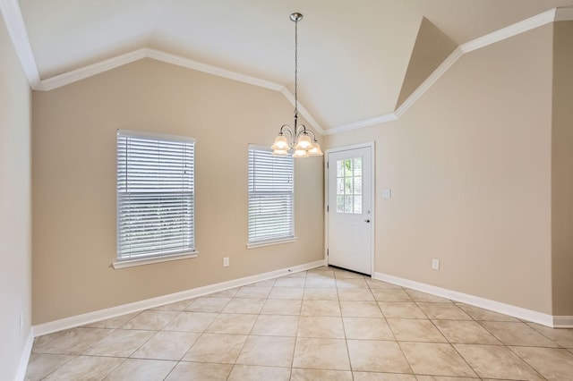 unfurnished dining area with baseboards, a chandelier, and vaulted ceiling