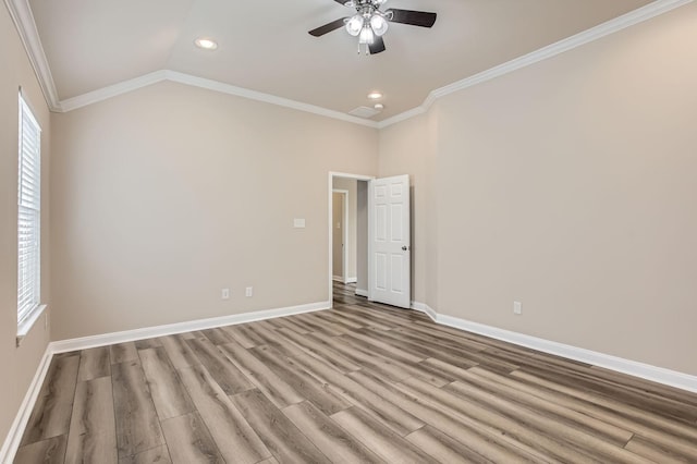 spare room with baseboards, recessed lighting, ceiling fan, and wood finished floors
