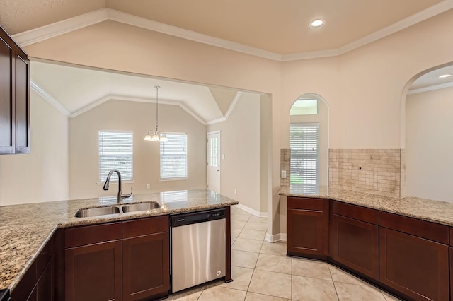 kitchen with light tile patterned flooring, light stone countertops, a sink, dishwasher, and arched walkways