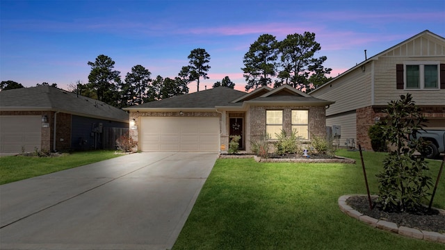 single story home with brick siding, an attached garage, driveway, and a front lawn