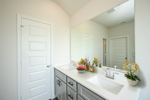 14238 Elkwood Pine Dr, Houston, TX 77032 - full bath with double vanity, a sink, and visible vents