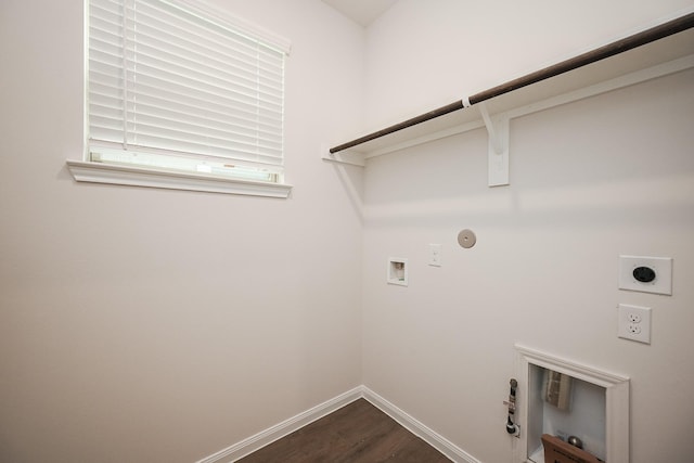 14238 Elkwood Pine Dr, Houston, TX 77032 - laundry area featuring laundry area, hookup for a washing machine, dark wood-style floors, gas dryer hookup, and hookup for an electric dryer