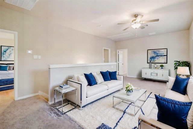 14515 Aston Pine Dr, Houston, TX 77032 - living room with carpet floors, ceiling fan, baseboards, and attic access