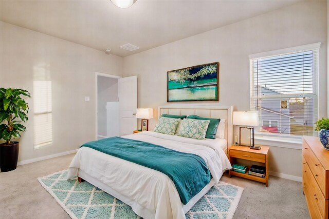 14515 Aston Pine Dr, Houston, TX 77032 - bedroom with baseboards, light colored carpet, and visible vents