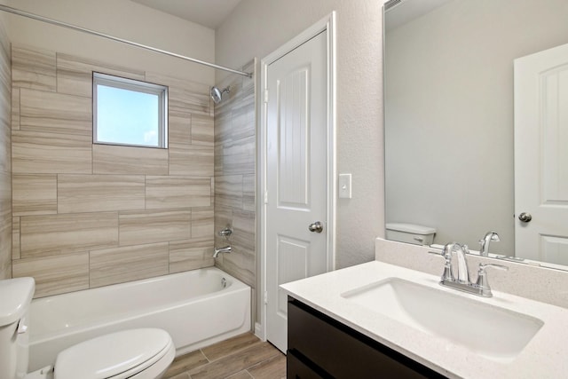 14515 Aston Pine Dr, Houston, TX 77032 - bathroom featuring vanity, shower / bathing tub combination, wood finished floors, and toilet