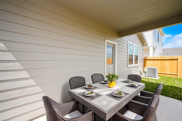 14515 Aston Pine Dr, Houston, TX 77032 - view of patio / terrace featuring central AC, fence, and outdoor dining area