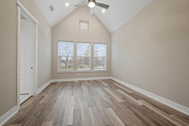 1220 Sloane Manor Trce, Houston, TX 77043 - unfurnished room featuring ceiling fan, visible vents, wood finished floors, high vaulted ceiling, and baseboards