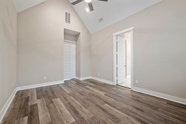 1220 Sloane Manor Trce, Houston, TX 77043 - spare room featuring dark wood-style flooring, a ceiling fan, high vaulted ceiling, and visible vents