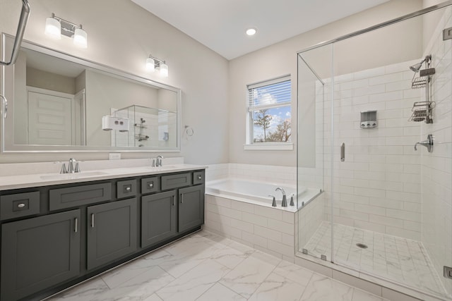 1220 Sloane Manor Trce, Houston, TX 77043 - full bath with a sink, a garden tub, and a stall shower