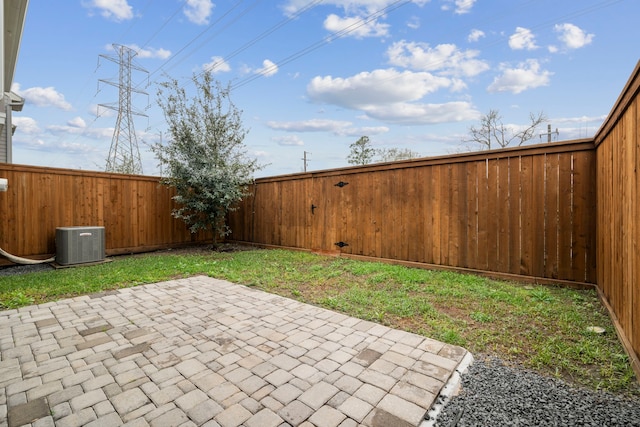 1220 Sloane Manor Trce, Houston, TX 77043 - view of patio with a fenced backyard and central AC