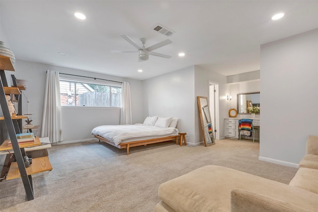 bedroom featuring baseboards, light carpet, recessed lighting, and visible vents