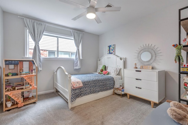 bedroom featuring carpet floors, a ceiling fan, and baseboards