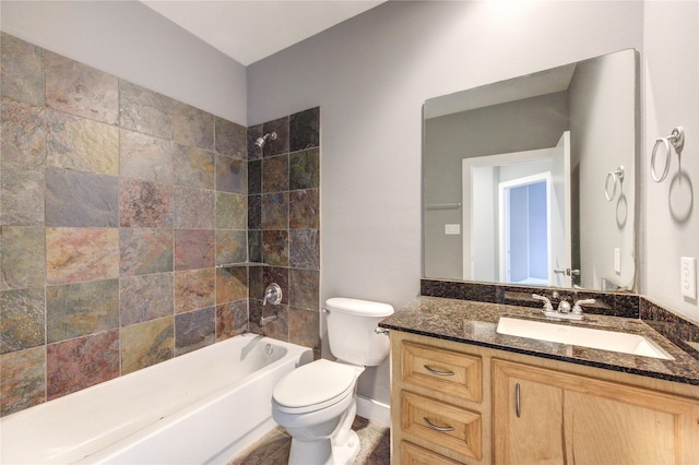 bathroom with toilet, baseboards, shower / bathing tub combination, and vanity