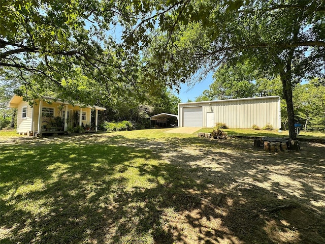 5325 County Road 2691, Buffalo, TX 75831 - view of yard featuring a garage and an outdoor structure