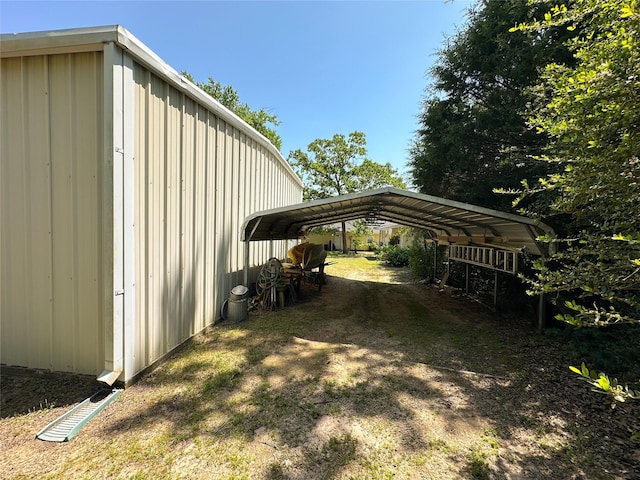 5325 County Road 2691, Buffalo, TX 75831 - view of outbuilding with a carport