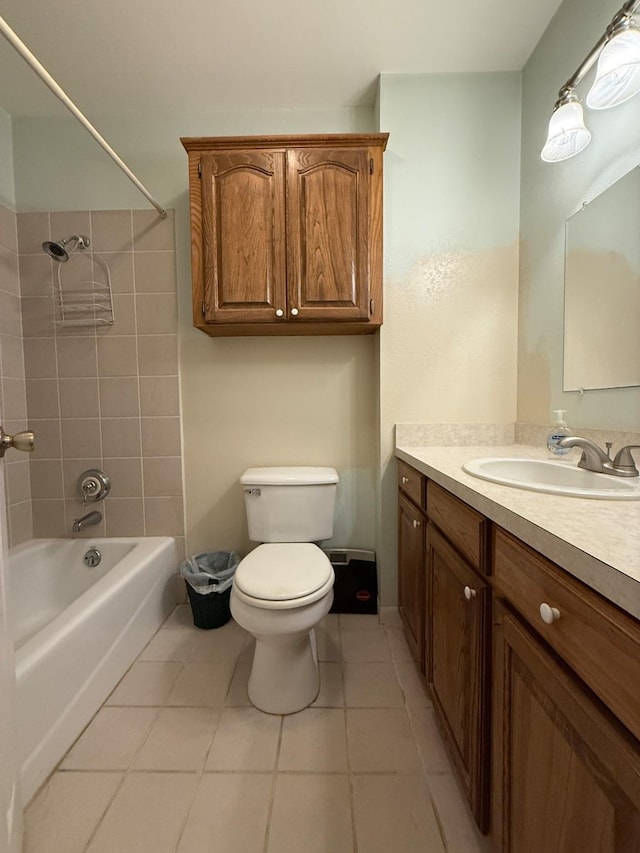 5325 County Road 2691, Buffalo, TX 75831 - bathroom with toilet, tile patterned floors, shower / washtub combination, and vanity