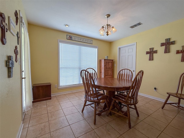 5325 County Road 2691, Buffalo, TX 75831 - dining area featuring an inviting chandelier, baseboards, and light tile patterned flooring