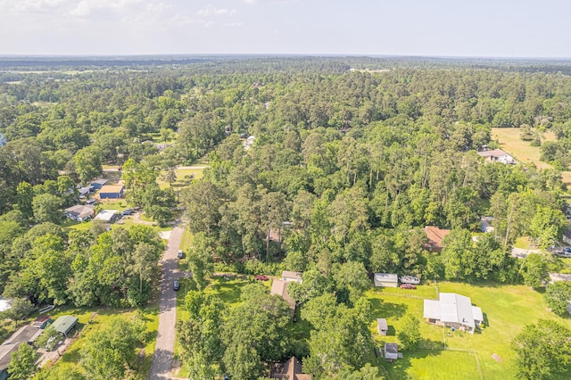 9847 N Lake Vw, Montgomery, TX 77316 - aerial view of property and surrounding area with a heavily wooded area