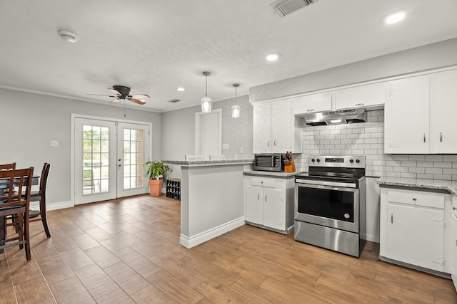 kitchen featuring visible vents, ceiling fan, under cabinet range hood, tasteful backsplash, and stainless steel appliances