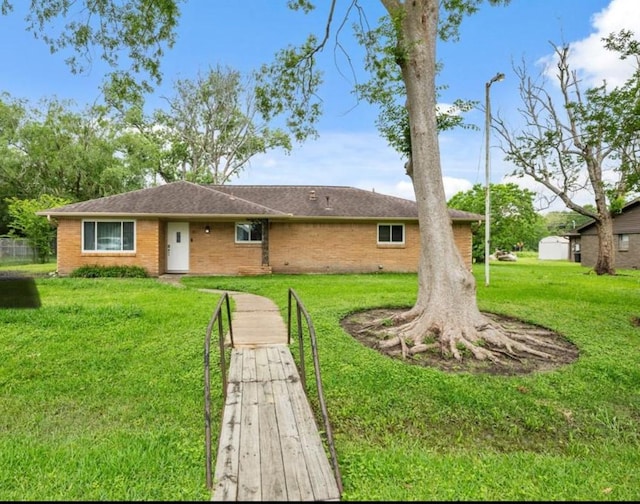 3811 Anna Ct, Santa Fe, TX 77517 - ranch-style home with a front yard and brick siding