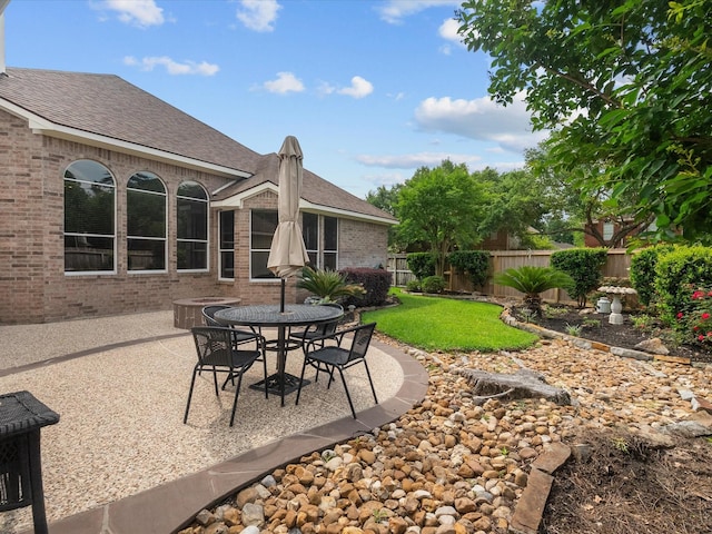view of patio / terrace with outdoor dining area and a fenced backyard