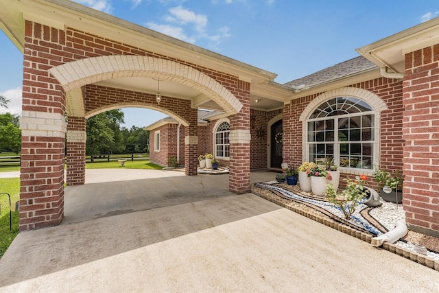 33519 Hillside Dr, Pinehurst, TX 77362 - view of patio / terrace featuring concrete driveway