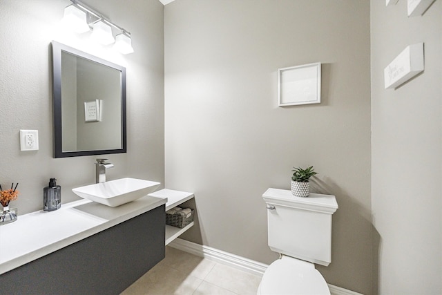 33519 Hillside Dr, Pinehurst, TX 77362 - bathroom featuring tile patterned flooring, toilet, vanity, and baseboards