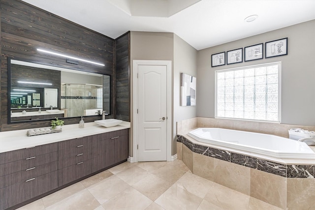 33519 Hillside Dr, Pinehurst, TX 77362 - full bathroom featuring a shower stall, a garden tub, tile patterned floors, and vanity
