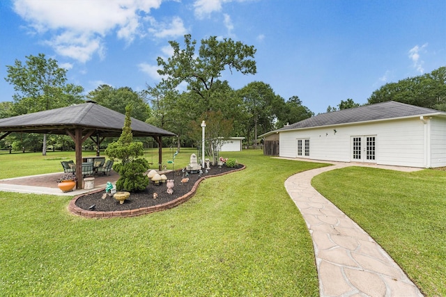 33519 Hillside Dr, Pinehurst, TX 77362 - view of green lawn featuring french doors and a gazebo