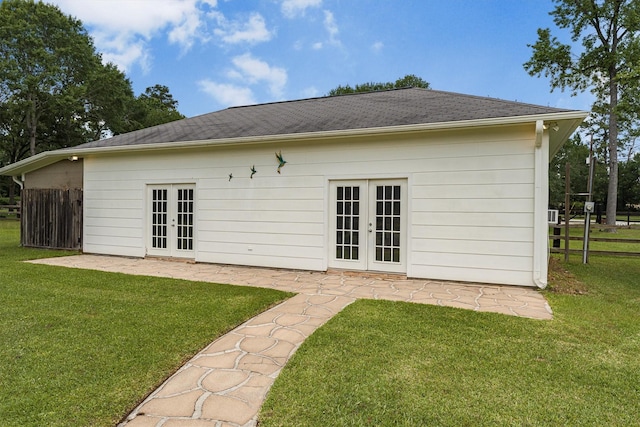 33519 Hillside Dr, Pinehurst, TX 77362 - rear view of property featuring french doors, a patio, and a shingled roof