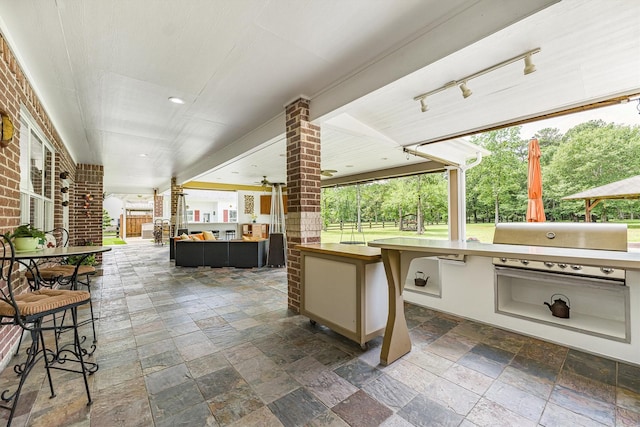 33519 Hillside Dr, Pinehurst, TX 77362 - view of patio / terrace with a grill