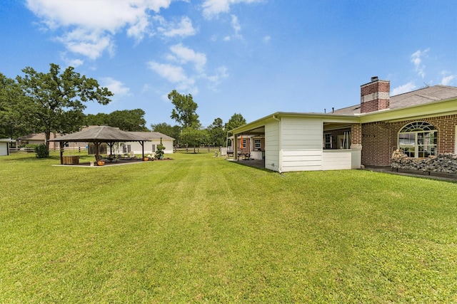 33519 Hillside Dr, Pinehurst, TX 77362 - view of green lawn featuring a gazebo