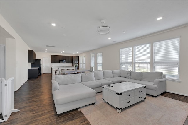 25553 Kensington Lake Dr, Porter, TX 77365 - living area with baseboards, recessed lighting, and dark wood-type flooring