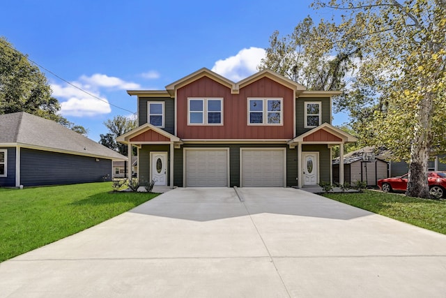 craftsman-style house featuring a garage, a front lawn, a storage unit, board and batten siding, and concrete driveway