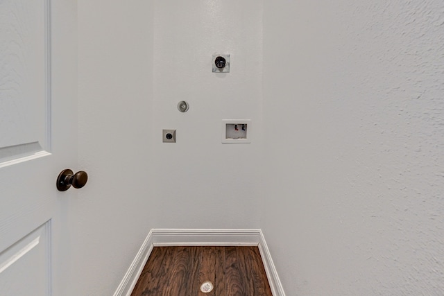 laundry room featuring laundry area, baseboards, dark wood-style floors, electric dryer hookup, and washer hookup