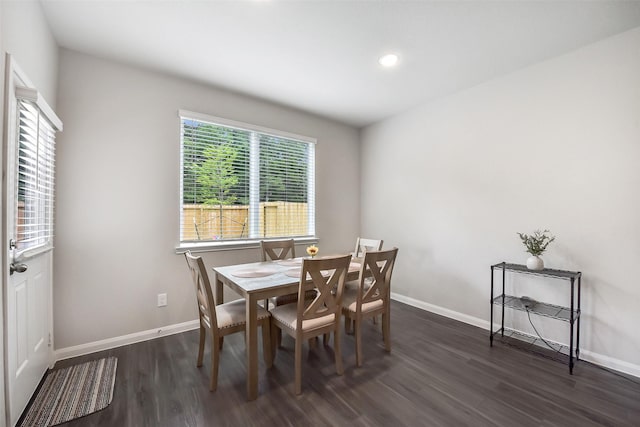 dining space with baseboards, recessed lighting, and dark wood-style floors