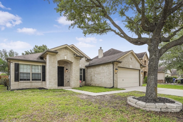 29634 Legends Line Dr, Spring, TX 77386 - view of front of home featuring brick siding, a garage, a front lawn, and driveway