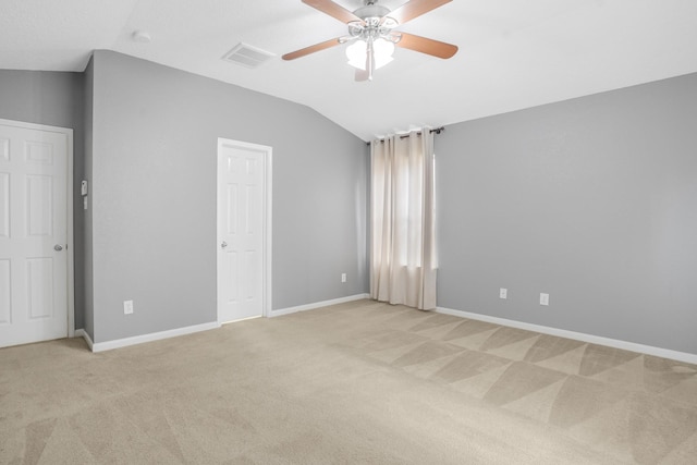 29634 Legends Line Dr, Spring, TX 77386 - unfurnished bedroom featuring light colored carpet, visible vents, and vaulted ceiling