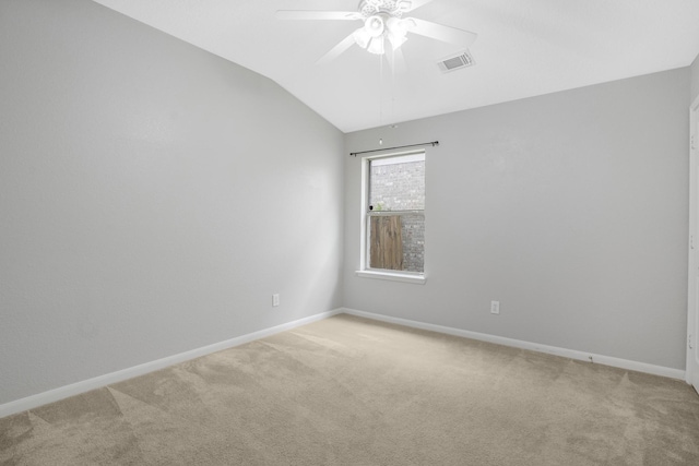29634 Legends Line Dr, Spring, TX 77386 - empty room featuring a ceiling fan, baseboards, vaulted ceiling, and light carpet