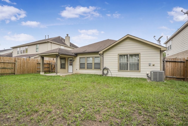 29634 Legends Line Dr, Spring, TX 77386 - rear view of property featuring a lawn, a fenced backyard, and cooling unit