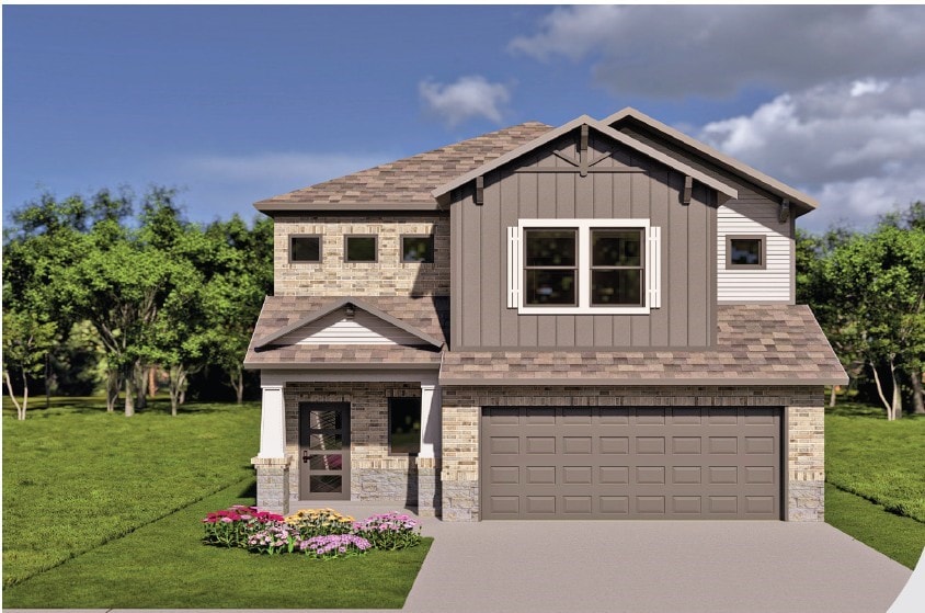 view of front of home with board and batten siding, an attached garage, concrete driveway, and a front yard