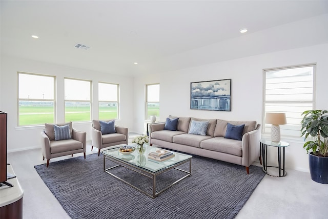 14519 Aston Pines Dr, Houston, TX 77032 - living room with visible vents, baseboards, a healthy amount of sunlight, and recessed lighting