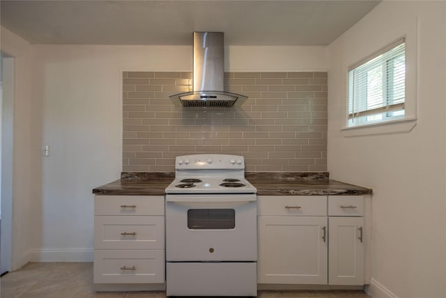 kitchen with dark countertops, electric range, white cabinetry, and island range hood