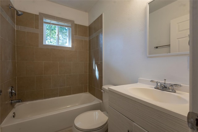 bathroom with vanity, toilet, and shower / tub combination