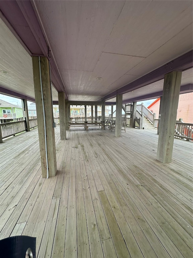 wooden deck featuring stairway