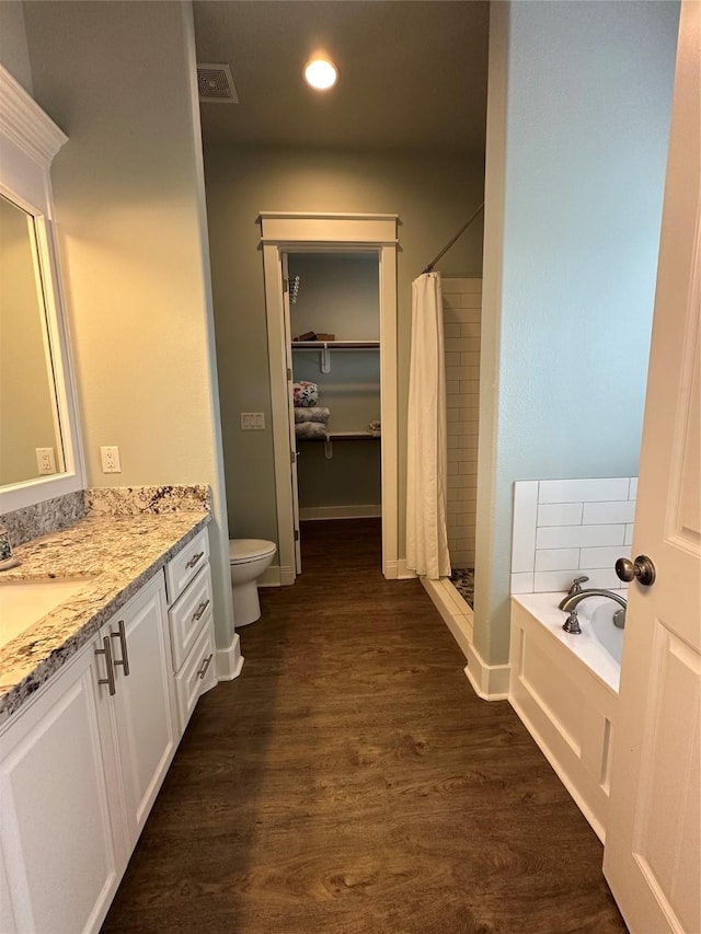 full bath featuring a garden tub, visible vents, a stall shower, vanity, and recessed lighting