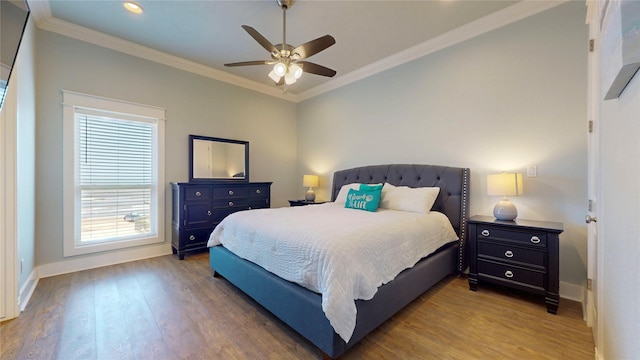 975 S Stingaree, Crystal Beach, TX 77650 - bedroom featuring wood finished floors, baseboards, ornamental molding, recessed lighting, and ceiling fan