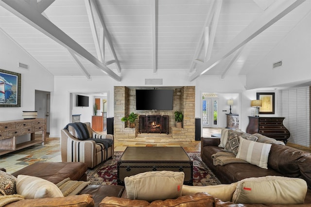 18 S Shore Dr S, Galveston, TX 77551 - living room with beamed ceiling, visible vents, high vaulted ceiling, and a fireplace
