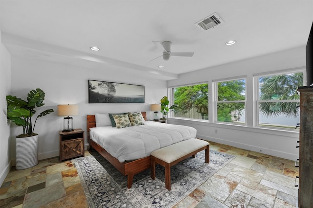 18 S Shore Dr S, Galveston, TX 77551 - bedroom with stone tile floors, recessed lighting, baseboards, and visible vents