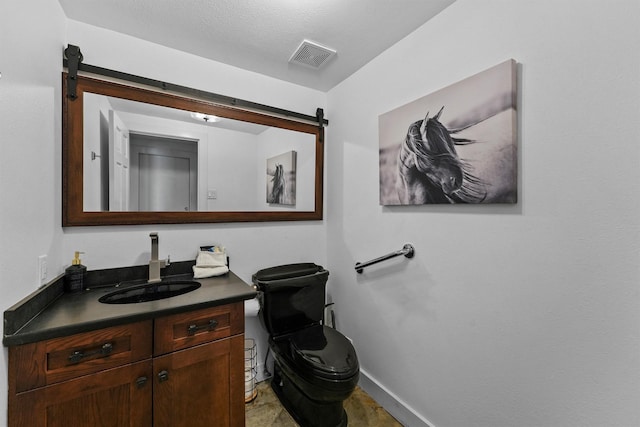 18 S Shore Dr S, Galveston, TX 77551 - bathroom with visible vents, baseboards, toilet, and vanity